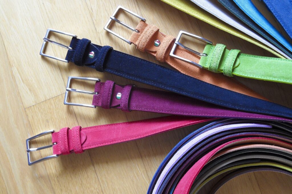 A row of different colored belts.