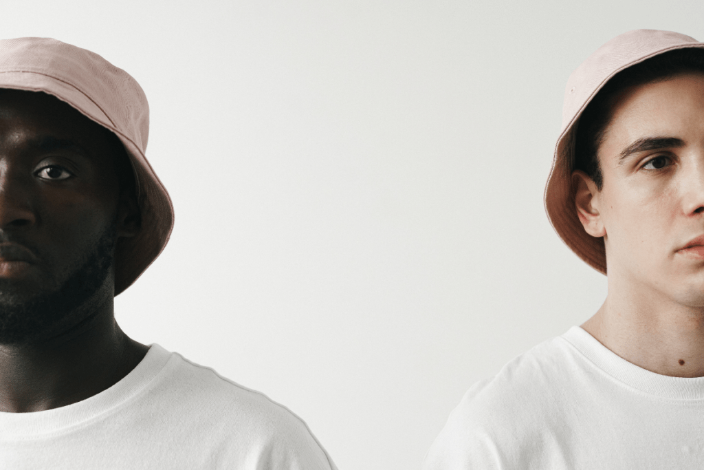 Two men showing different styles of bucket hats.